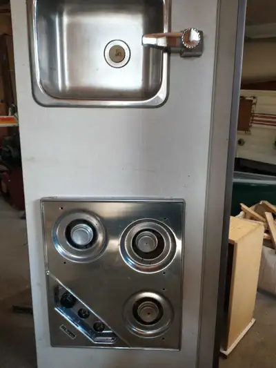 Fridge, heater, stove, sink, mattresses. All taken out of tent trailer. $150 obo