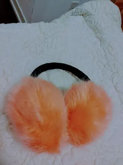 Brand new orange pinkish colour warm fur earmuff.