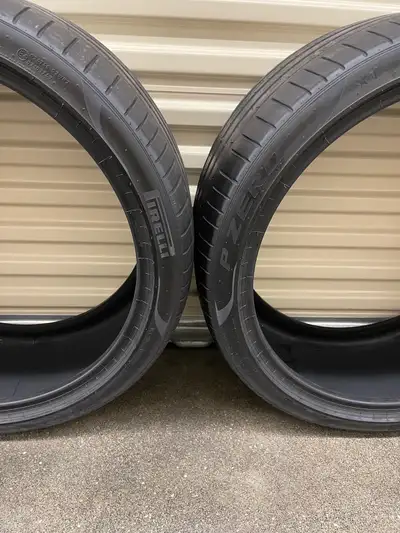 Pair. 275/35R22 104Y XL Pirelli P Zero (PZ4-Luxury). FIRM $180: Two Used Ultra High-Performance segm...