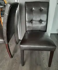 2 faux leather chairs