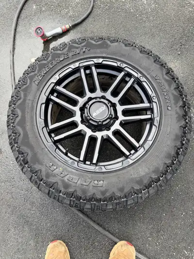 Rssw 20” rims with 295/60/20 radar renegade rt tires , good tread left . Two center caps are missing...