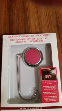 Purse Holder & Microlight  $5 New , never used  **