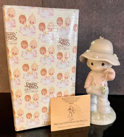 Many Retired Precious Moments in Mint condition, original boxes, View more