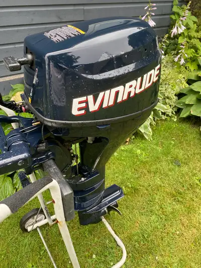 Evinrude 9.8 hp four stroke long shaft outboard. One owner with under 40 hours since new. Pristine n...