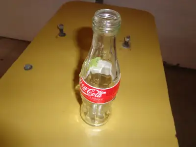 Small coke bottles priced at $1 each