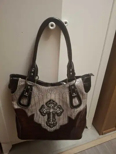 2 purses for sale, View more
