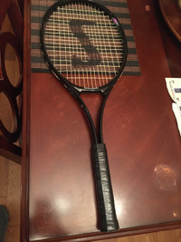 I’m selling a mint tennis racket and cover