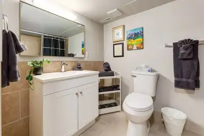 Updating our bathroom design, so this solid white vanity is looking for a new home. Good condition w...