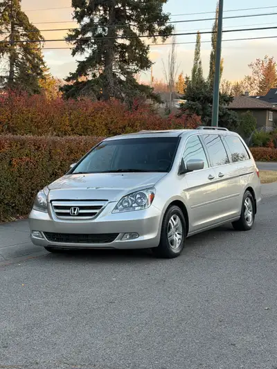Selling my 2007 Honda Odyssey EX-L with DVD and heated seats, low mileage and Dealership maintained....