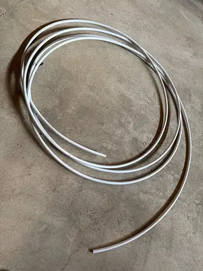 This is a coil of half-inch PEX pipe, perfect for plumbing projects around the house; it's durable a...