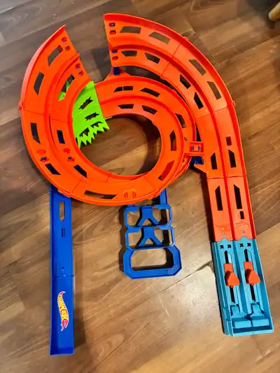 Hotwheels car track with a few cars included (not pictures) can fold up for easy storage. Barely use...