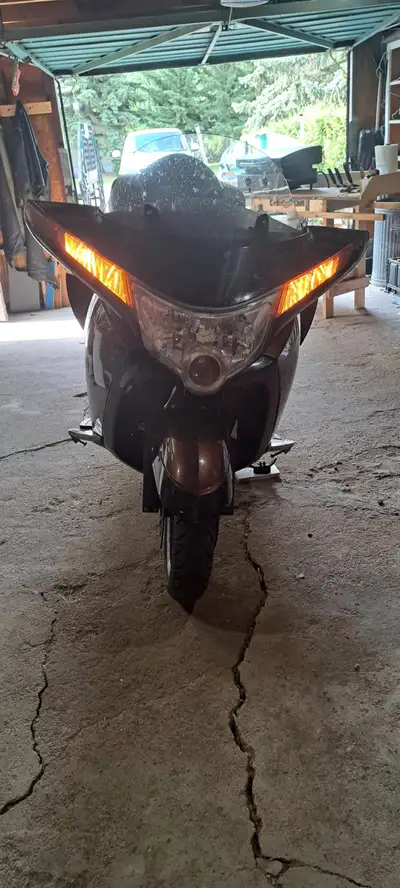 knees are shot, its time to hang up the helmet. this is an awesome touring/cruising.bike. repainted...