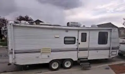I am a senior looking for a used, decent , dry , travel trailer, or an RV . No need to be newer. Fix...