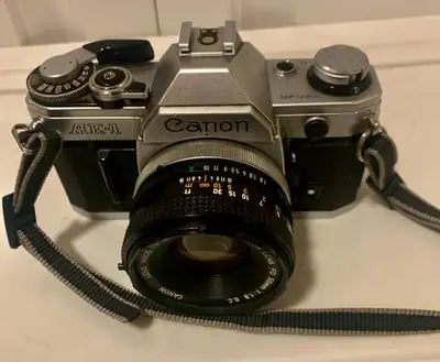 Canon AE-1 35mm Film Camera FD 50mm 1:1.8 Lens, View more
