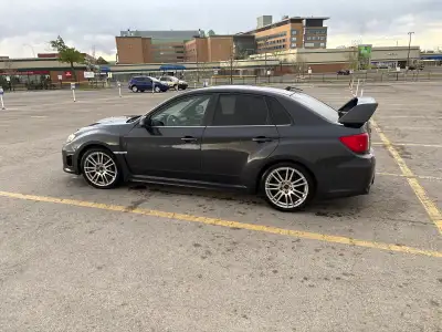 2013 Subaru WRX STI Sport Tech, 6-speed manual. Fully stock, unmodified, and well maintained. Clean...