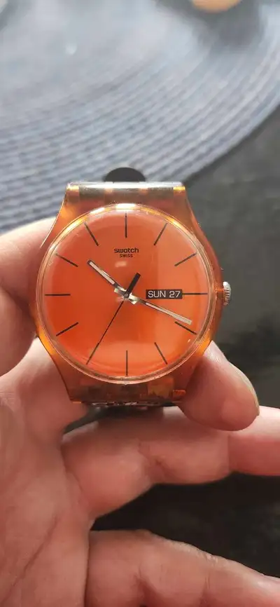 This is a limited special edition Jollie Bee Swatch with a day and date display, as you can see in t...