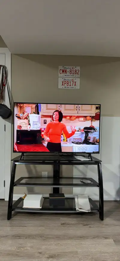LG 50” 4K Smart TV + Glass TV Stand – Excellent Condition, View more