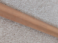 Baseboard, solid wood, NOT fibreboard or particleboard