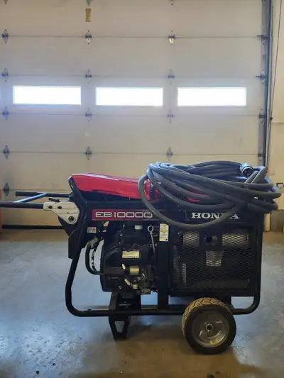 * Has been run for only 91 hours. * Includes the cable to plug into the house ($900 value). * Just h...