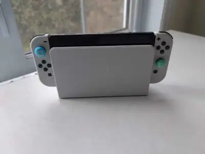 Like new/Comme Neuf Nintendo switch Oled, View more