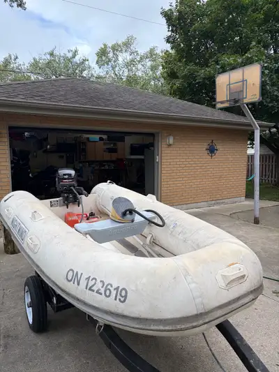 8’ 2006 Aqua Pro ribbed inflatable and 1992 9.9hp Merc. Trailer NOT included. 519 984 7153. 1,100.00