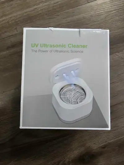 New UV Ultrasonic Cleaner. Cleans jewellery, dentures, aligners, and more. Includes power adapter.
