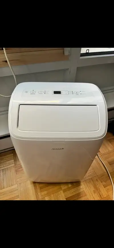 Selling a NOMA portable air conditioner, Comes with the remote control 10,000 btu like new with WI-F...