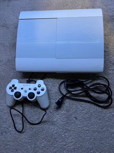 White PS3 Super Slim. Has a bunch of games installed and HEN jailbreak installed