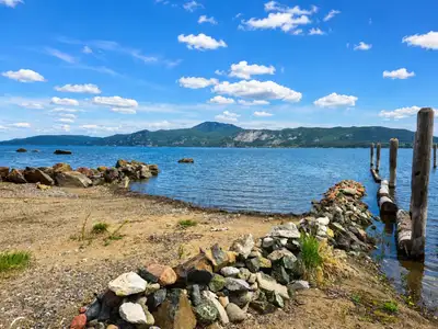 Imagine beginning each day with a completely unobstructed view of Stuart Lake on this 0.73-acre prop...