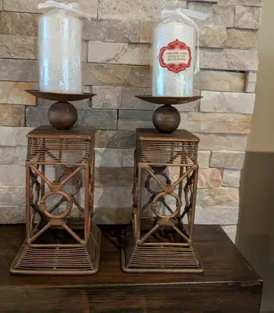 Bronze candleholders with candles, View more