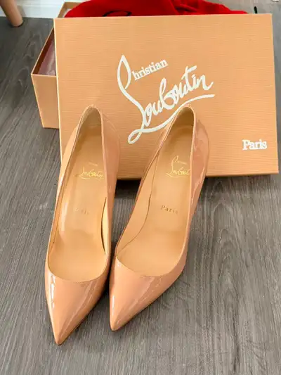 Selling a pair of Christian Louboutin Kate 100mm Pumps in patent leather (blush/nude color). Size: E...