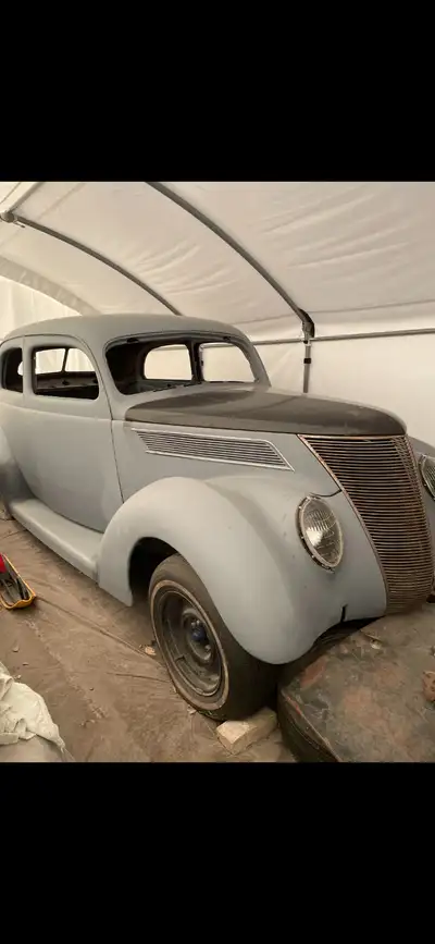 1937 ford Tudor humpback all steel body . New floors, excellent sheet metal. It has a Mustang II fro...