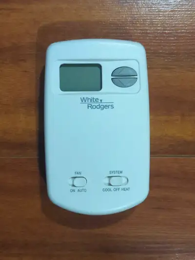 White Rodgers thermostat. Worked great but I upgraded mine. Please check out my other ads as well.