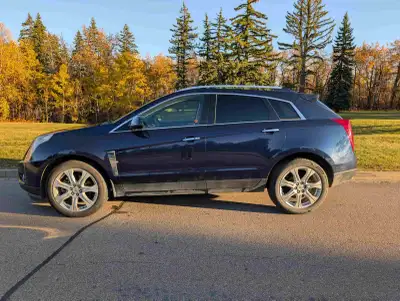 Luxury, Style & Performance! Beautiful 2011 Cadillac SRX Performance Edition featuring a powerful 2....