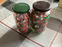 Glass jar of red and green can/pop tabs