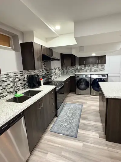 This modern, fully furnished , 1 bedroom basement apartment offers a bright and comfortable living s...
