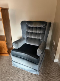 Upholstered wingback rocking chair