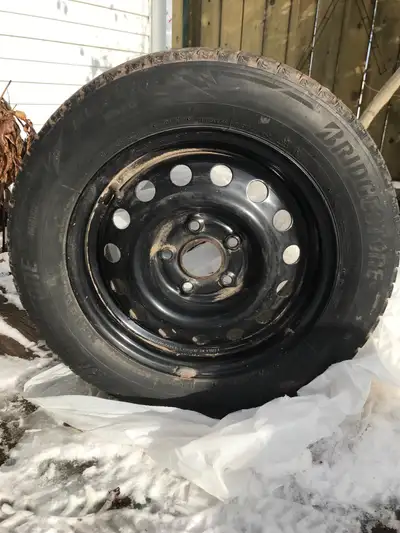 195/65R15 Bridgestone Blizzak on rims. Set of four, off Honda Civic, new September 2024. Do not fit...