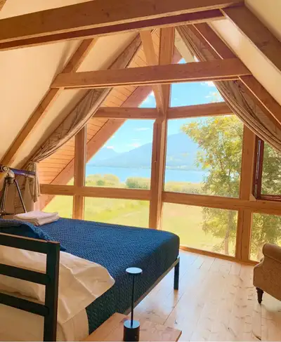 Redfish Lakehouse is a great lakefront vacation spot here in Nelson, BC. This 1970's post and beam c...