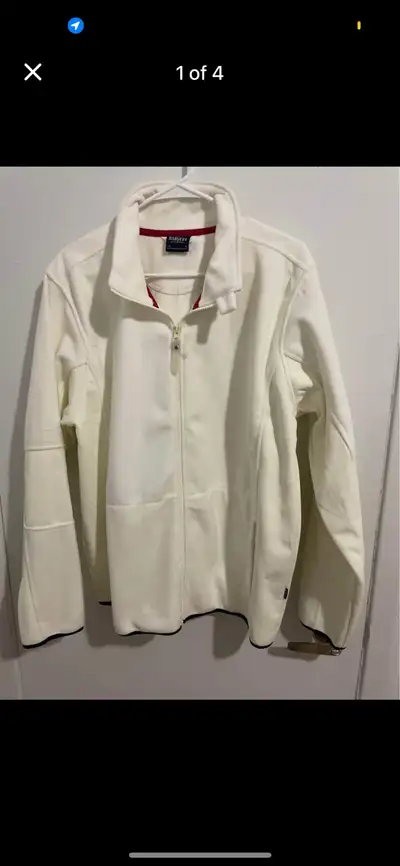This is a a brand new white James Harvest jacket in a size large, perfect for layering or wearing on...