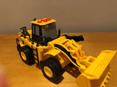 Caterpillar CAT Front End Loader w/ Lights - Yellow 1997 Toy- $15 Pick up in Orleans.