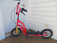 Red push scooter with inflatable 12" tires