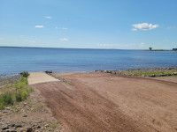 True Waterfront home with a Beach on Grand Lake NB