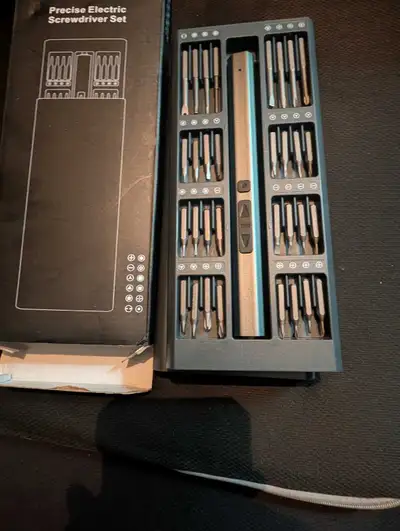 For sale a small precise electric screwdriver set new in the box never used great for small jobs or...