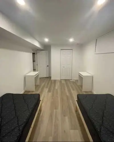 At the West end of Kingston. There are 3 bedrooms. It is a fully furnished new building. Rooms are s...