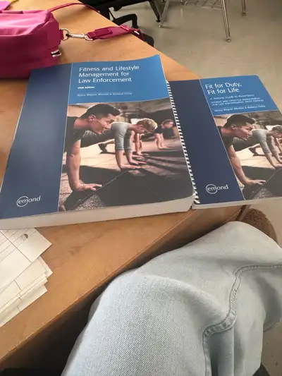 I'm offering two used books: 'Fitness and Lifestyle Management for Law Enforcement' and 'Fit for Dut...