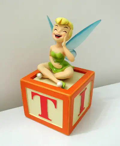 Tink Memento Box BNIB Comes in styrofoam packaging Share a giggle with Tink, sitting mischievously a...