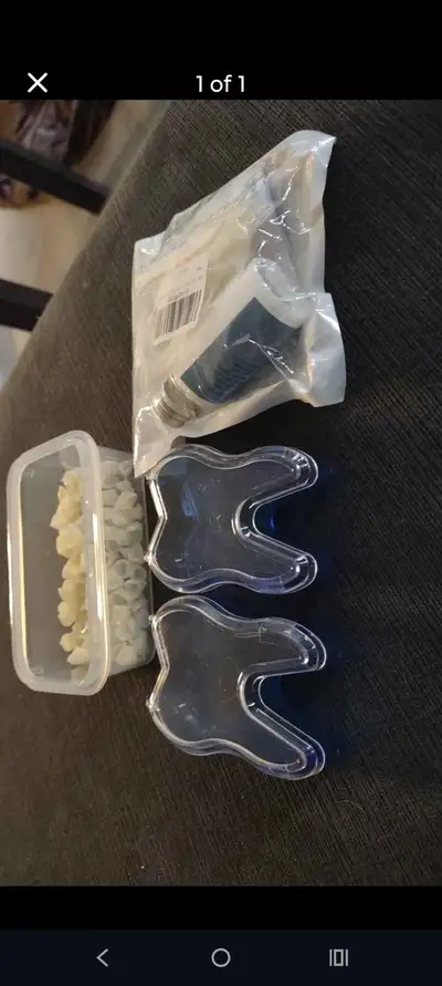 Brighten your smile with this teeth repair kits, which includes a container of whitening tabs, white...