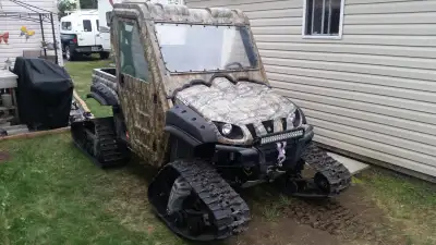 2009 Yamaha Rhino 700 w/ Full Cab & Tracks for sale. Comes with Full Camo Cab w/ Easily Removable Do...