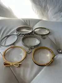Kate Spade, Michael Kors, and Coach bracelets 